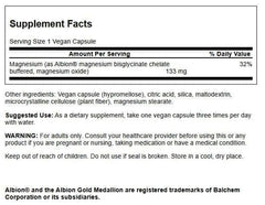 Swanson Albion Magnesium Glycinate capsules close-up, chelated for better absorption.
