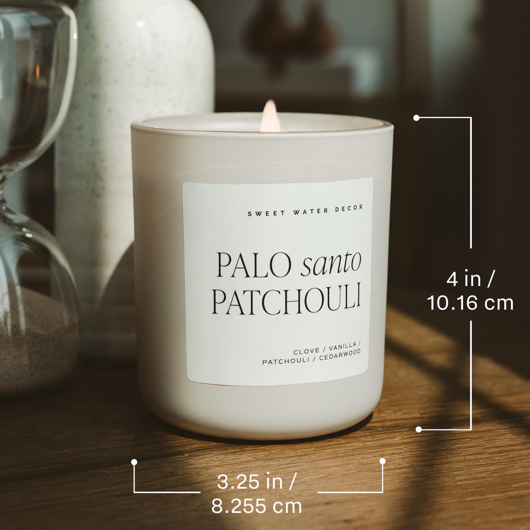 Sweet Water Decor Relax, Girl candle wick closeup reveals steady flame for consistent scent release.