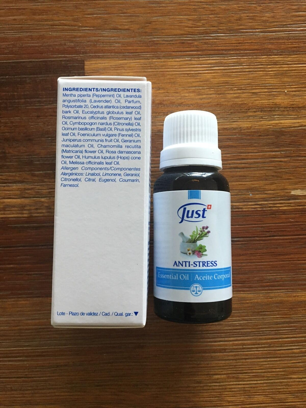 SwissJust Stress Relief bottle pour releasing soothing vapors for relaxation.