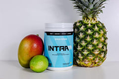 Close-up of Swolverine Intra Tropical Blast bottle highlighting label transparency.
