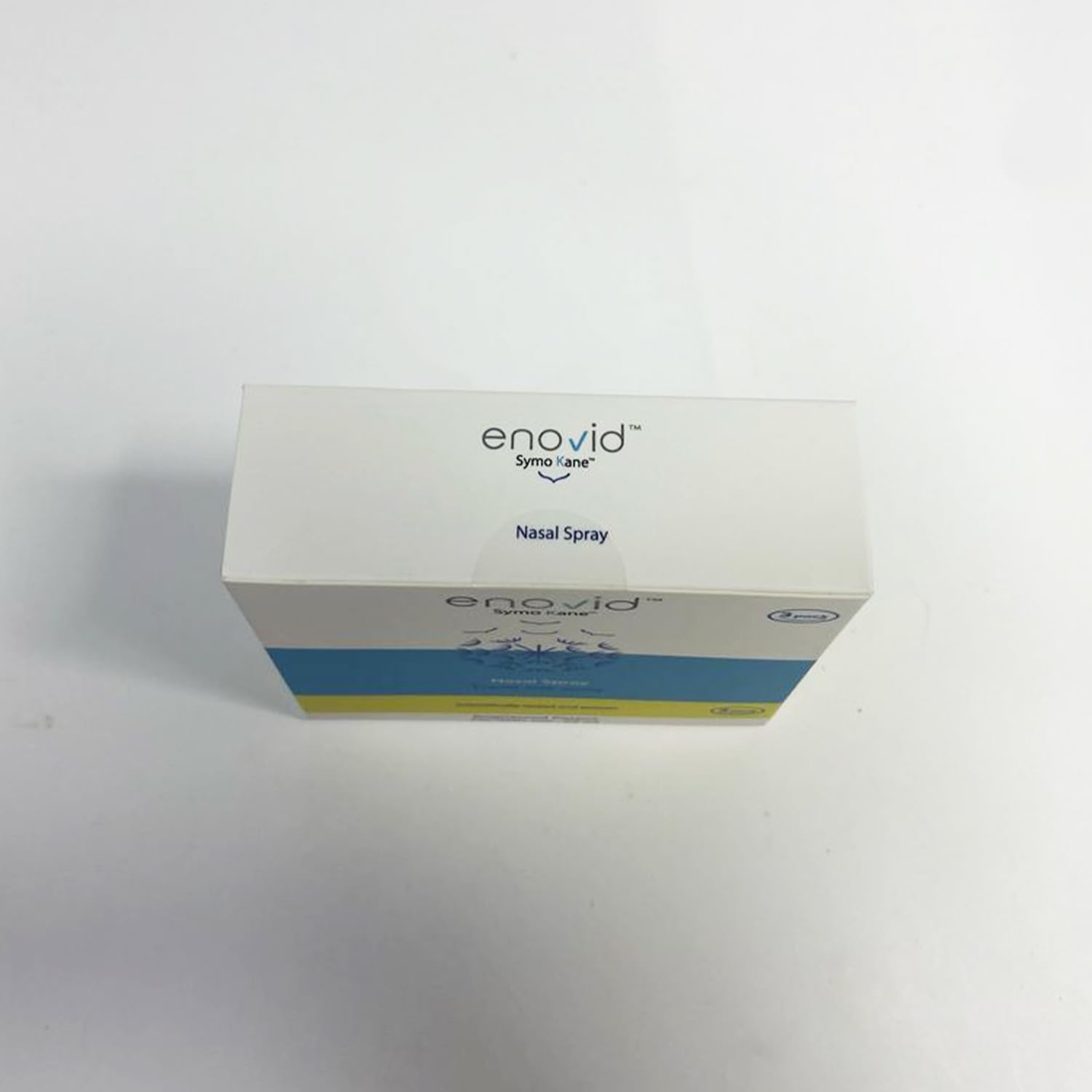 Symo Kane Enovid daily-use application shows easy, targeted nostril coverage
