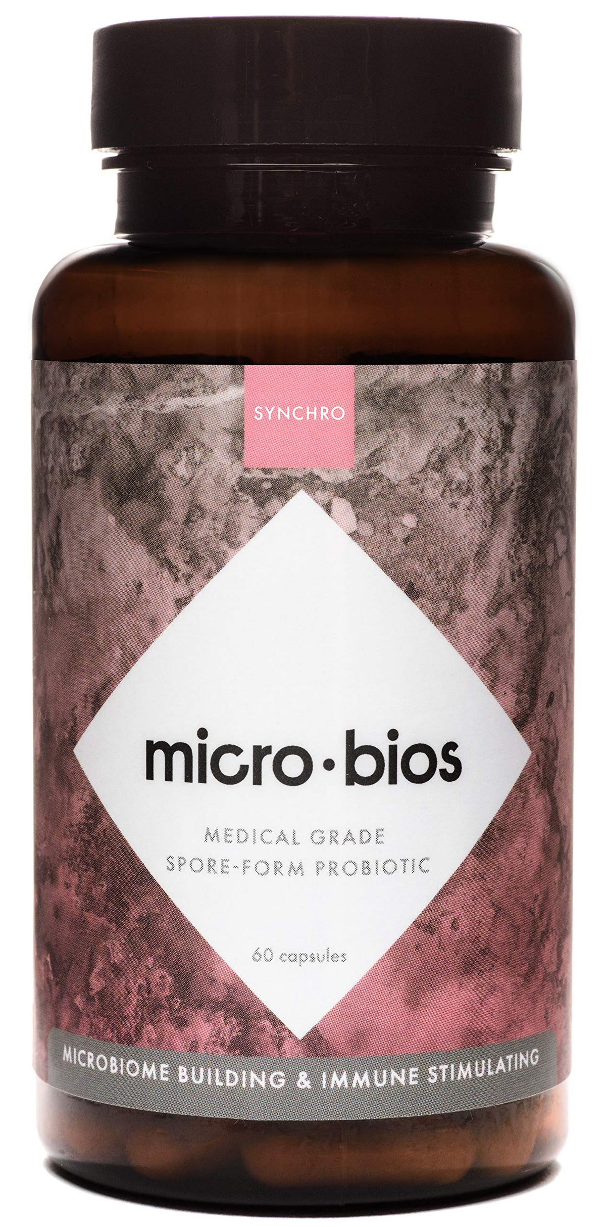 Synchro MicroBios bottle close-up showing capsules for immune and gut health support.