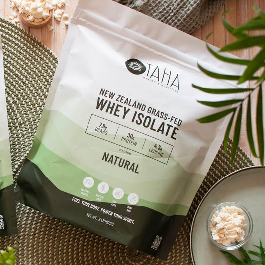 Taha Health & Nutrition whey isolate powder close-up, pure and clean for versatile mixability.
