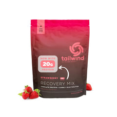 Tailwind Recovery Mix bottle pour for quick post-workout hydration in strawberry flavor