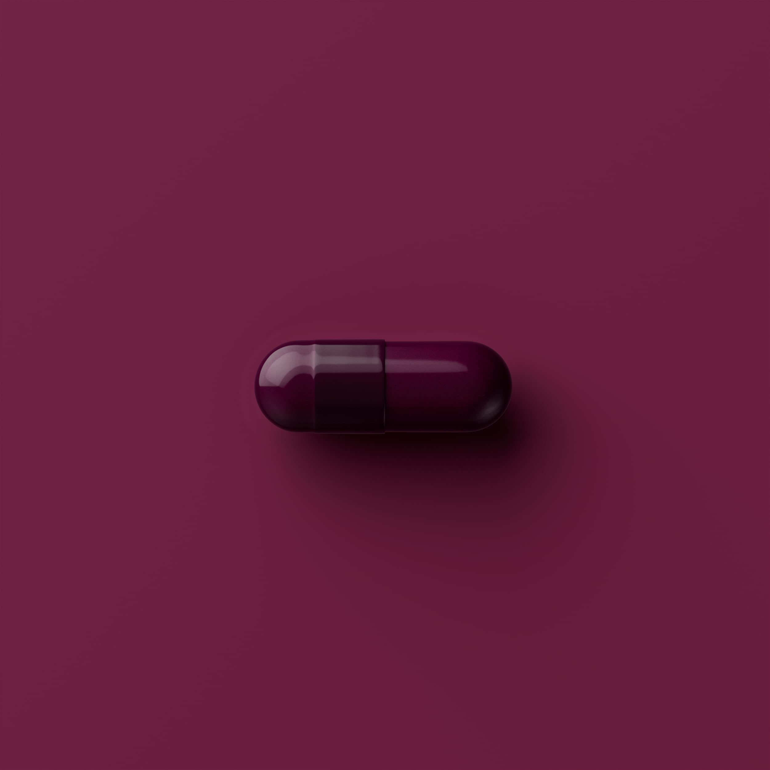 Assorted Tally Health Longevity Formula packaging and capsules to convey full-body wellness.