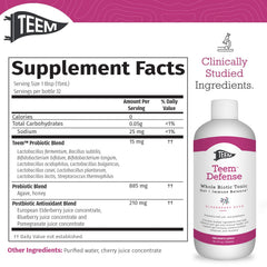 Teem Defense elderberry probiotic tonic in a glass for sipping