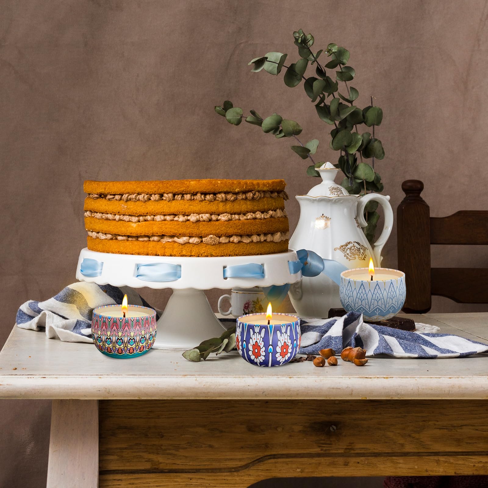 Tengyukenny Vanilla candle in metal jar creates warm, cozy atmosphere.