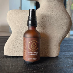 Box and bottle of Terra Health Essentials Liposomal B12 packaging