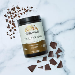 Glass with finished drink showing chocolate hue and Terra Origin label