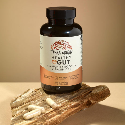 Terra Origin immunity boost capsules close-up featuring vitamins C and D.