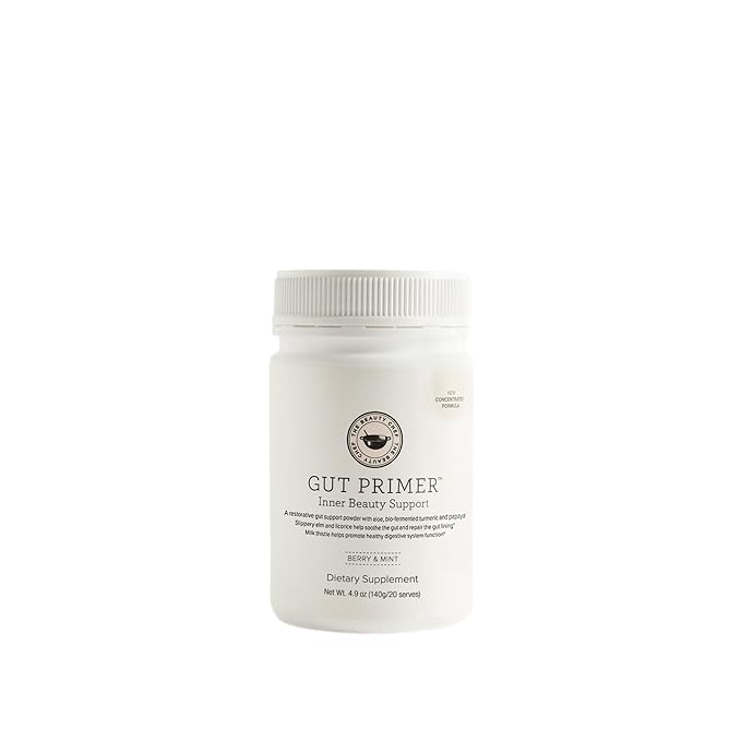 The Beauty Chef Gut Primer bottle being poured for daily gut support