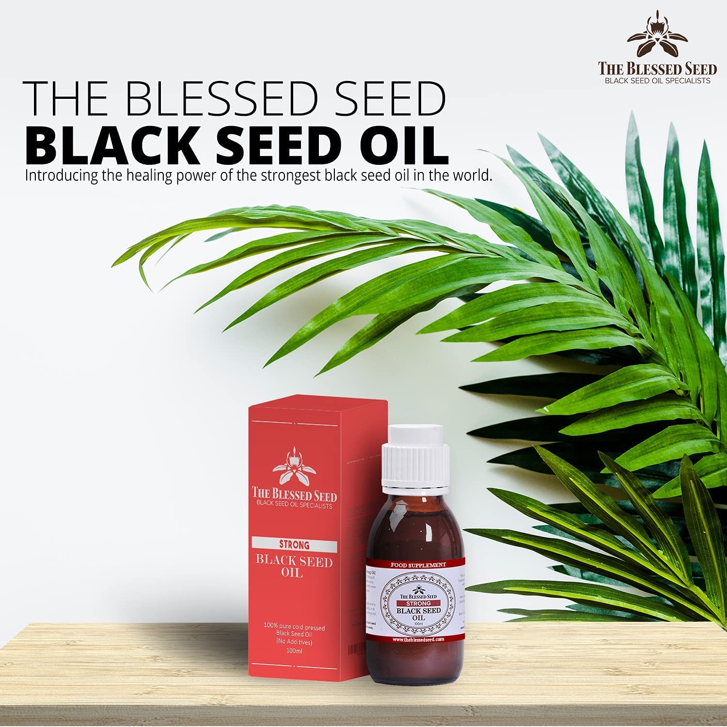 The Blessed Seed amber bottle with no-drip spout preserves freshness.