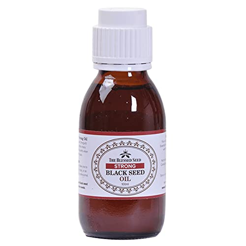 The Blessed Seed oil being poured over food shows versatile daily use.