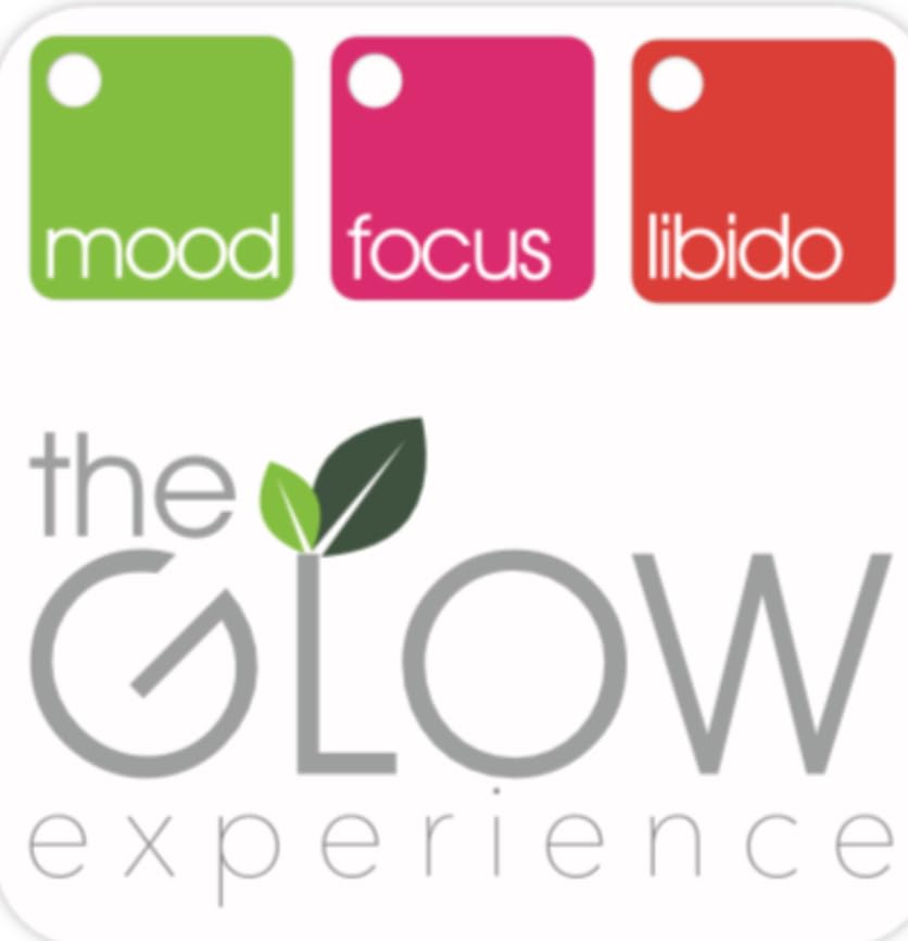 The Glow Experience user taking a capsule during a busy morning for focus.