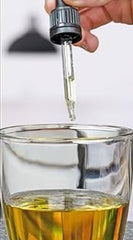 The Inner Healing Institute bottle on a desk for daily wellness.