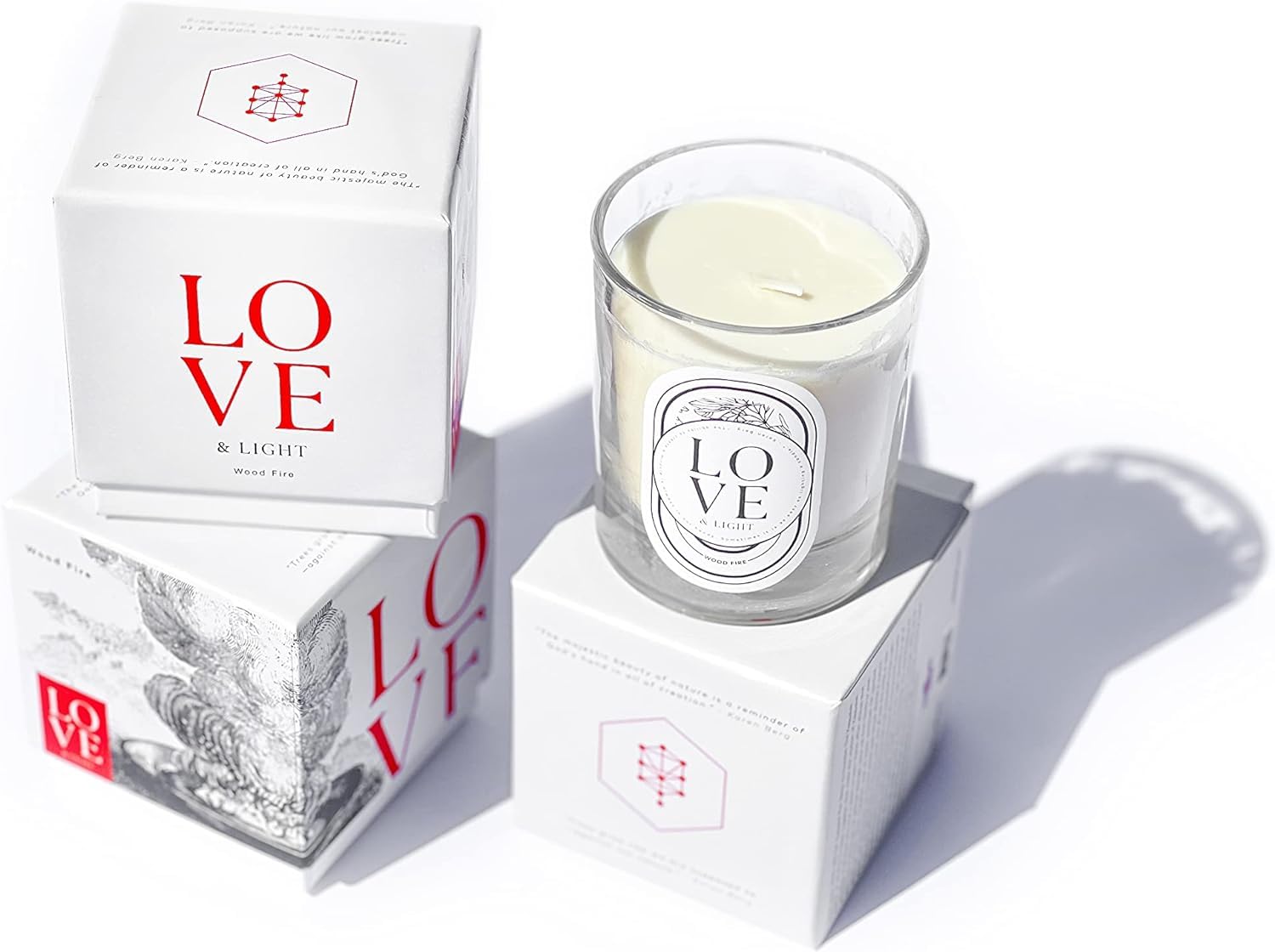 The Kabbalah Centre Wood Fire candle emits earthy warmth for cozy evenings.