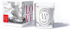 The Kabbalah Centre Wood candle in a glass jar enhances ambiance with inviting aroma.