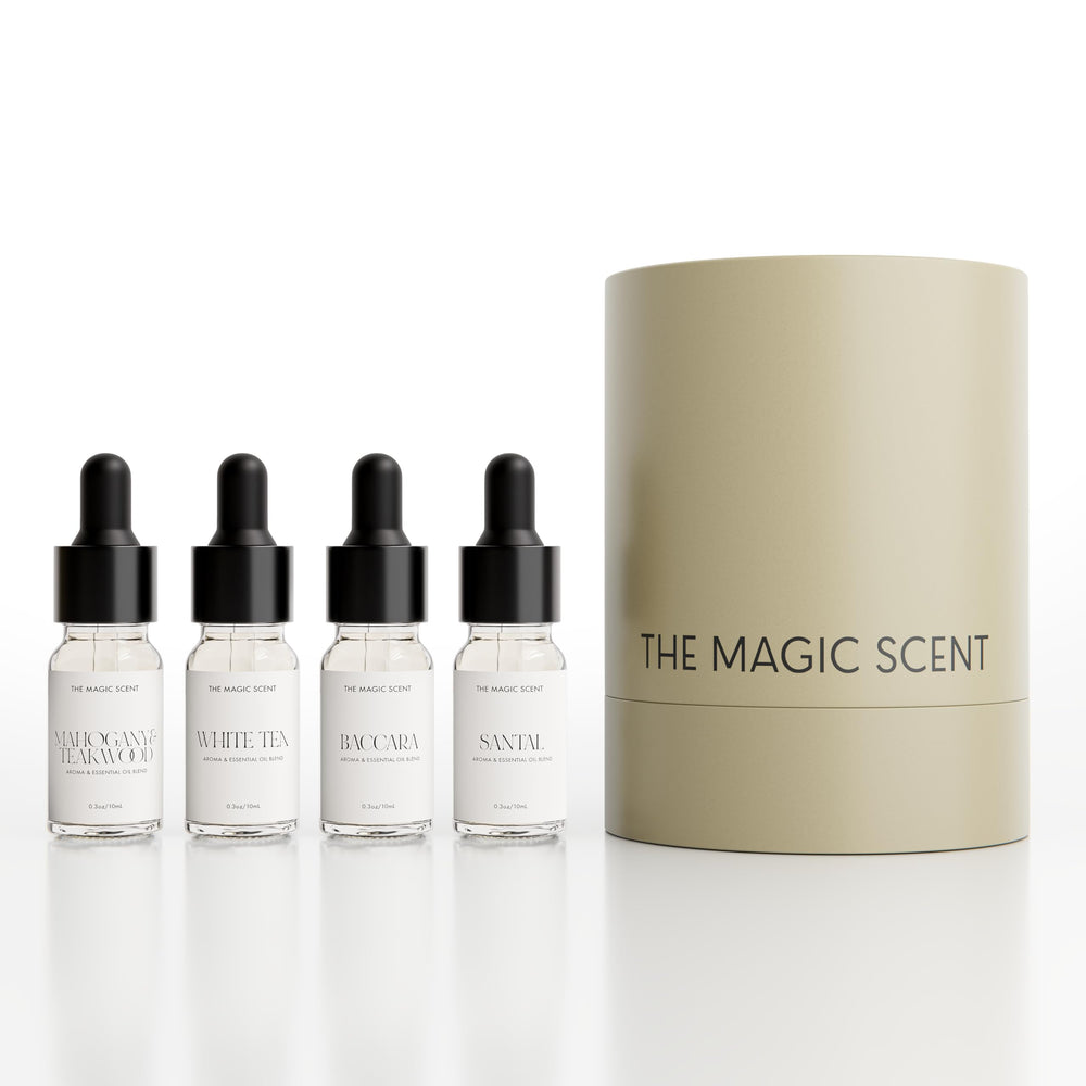 The Magic Scent Mahogany Teakwood 10ml diffuser oil bottle enhances home ambiance.
