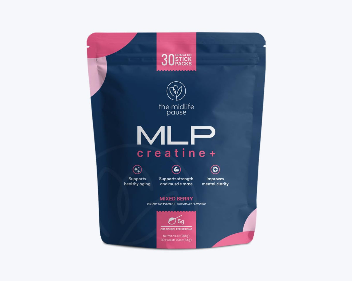 The Midlife Pause Creatine mixed berry powder shown with a scoop for workouts and recovery