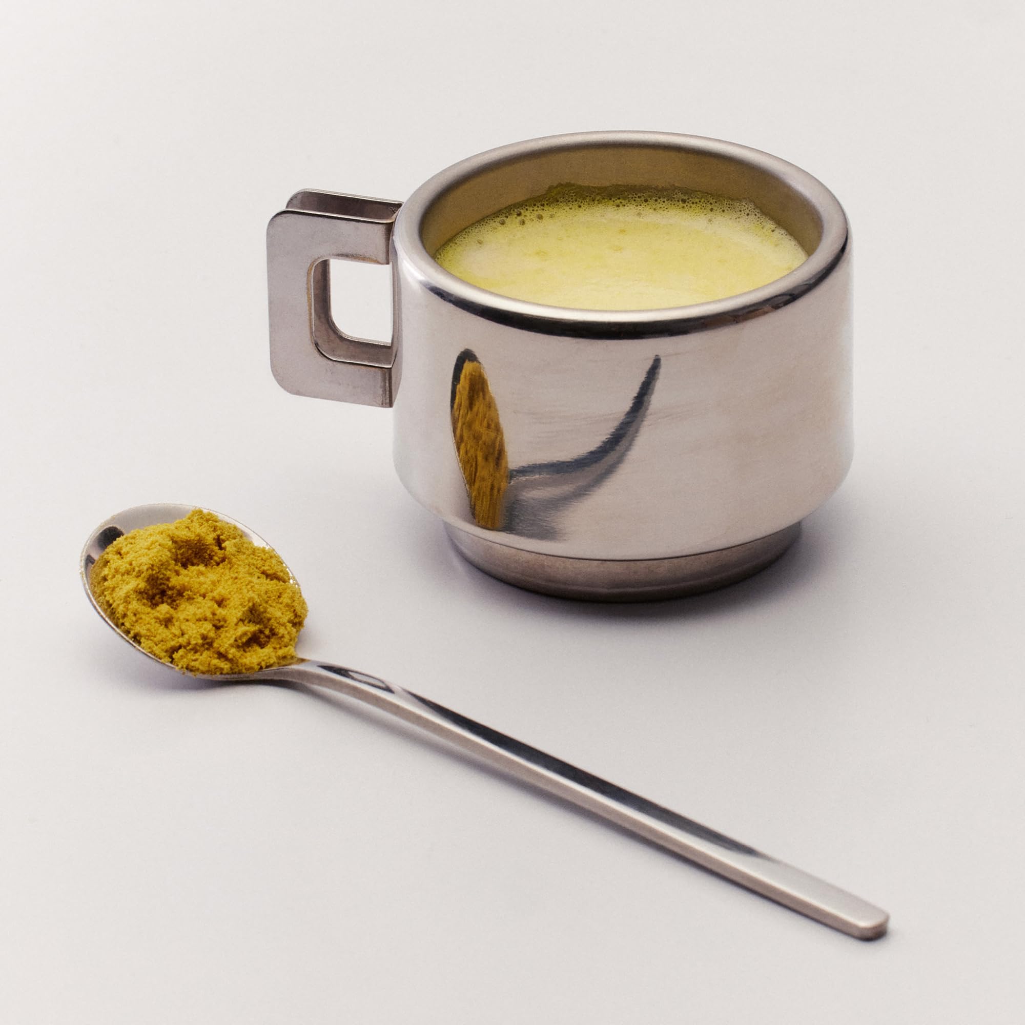 The Nue Co Debloat jar shown in a kitchen, ready for convenient daily use.
