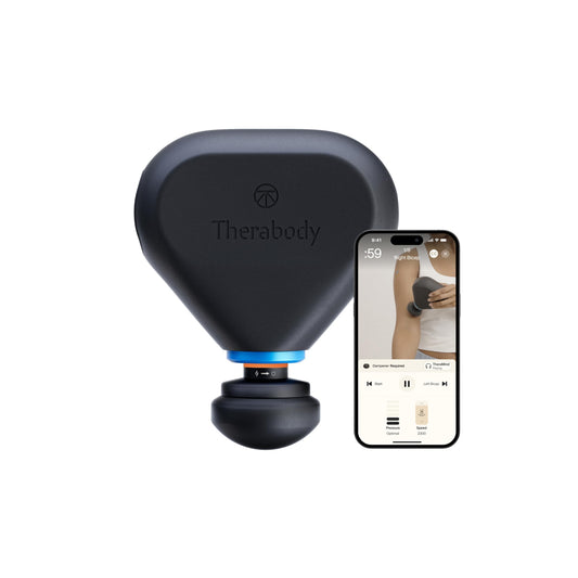 TheraGun Mini Plus in use with heat therapy for targeted relief