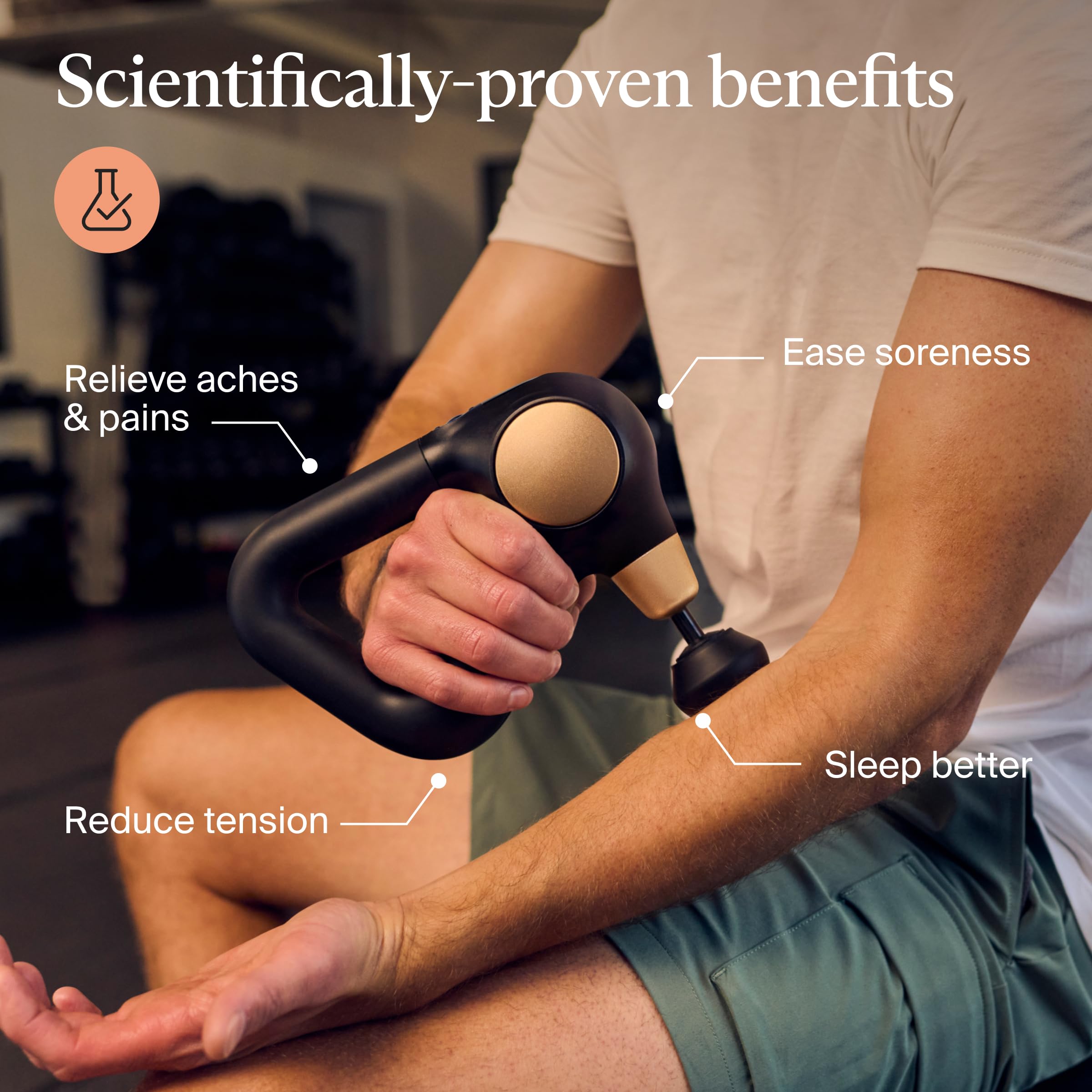 Theragun Sense 2nd Gen ergonomic triangle grip for easy reach.