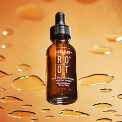 Close-up of Therrootbrands Clean Slate liquid ready to drop into the mouth.