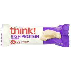 thinkThin white chocolate bar on wood board for on-the-go snacking
