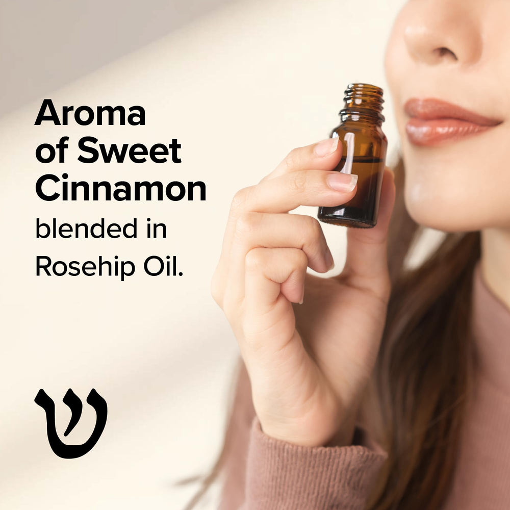 Tholi Oil cinnamon-forward aroma bottle for warm, earthy prayers and meditation.