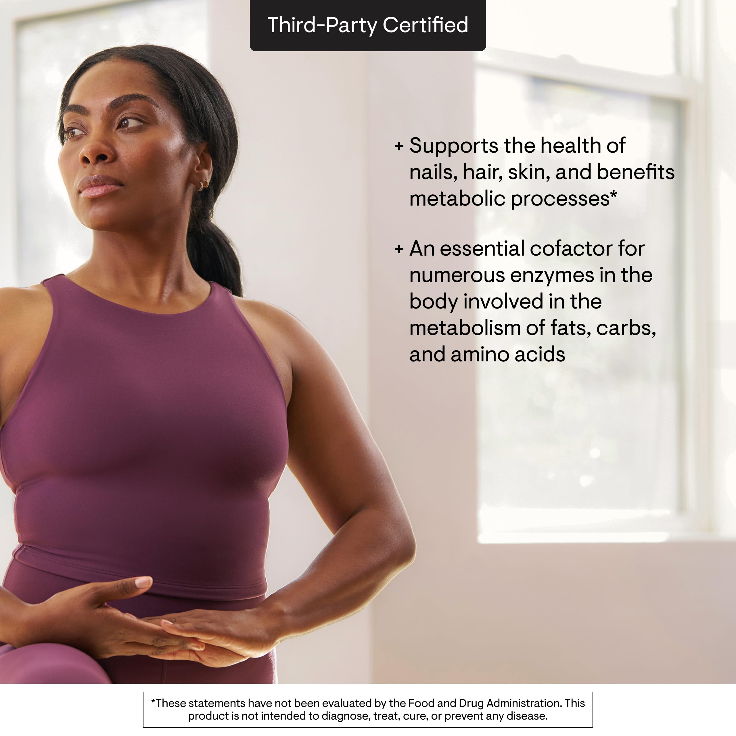 Thorne Biotin bottle top detail highlights easy-to-take daily capsules