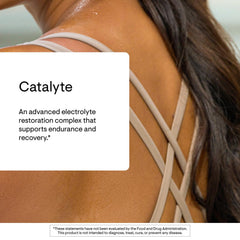 Glass of THORNE Catalyte solution ready to hydrate during training.
