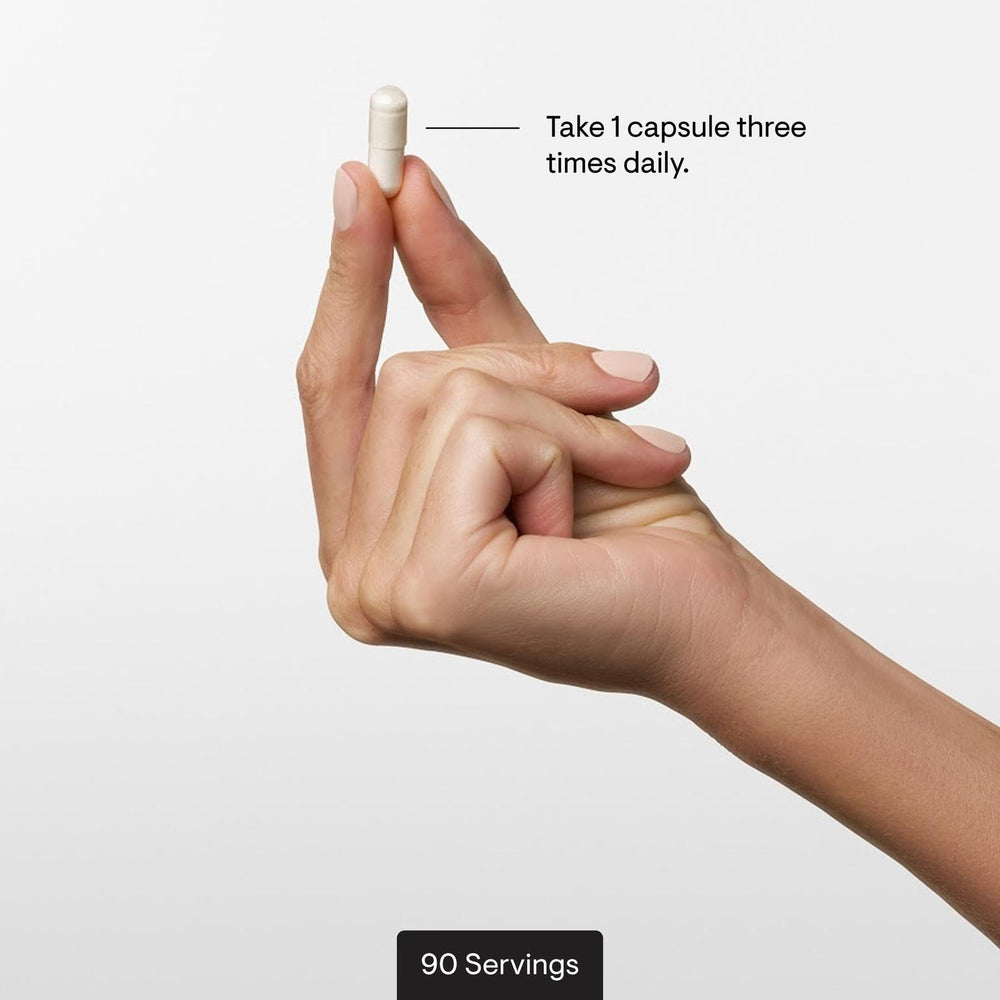 Capsules displayed on a clean surface indicate portable joint care for on-the-go use.