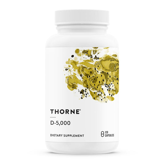 Thorne Vitamin D-5000 bottle pour demonstrates convenient daily use for bone support.