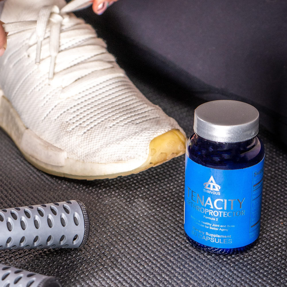 Thrivous Tenacity Arthroprotector capsules and dose cup suggesting simple dosing.