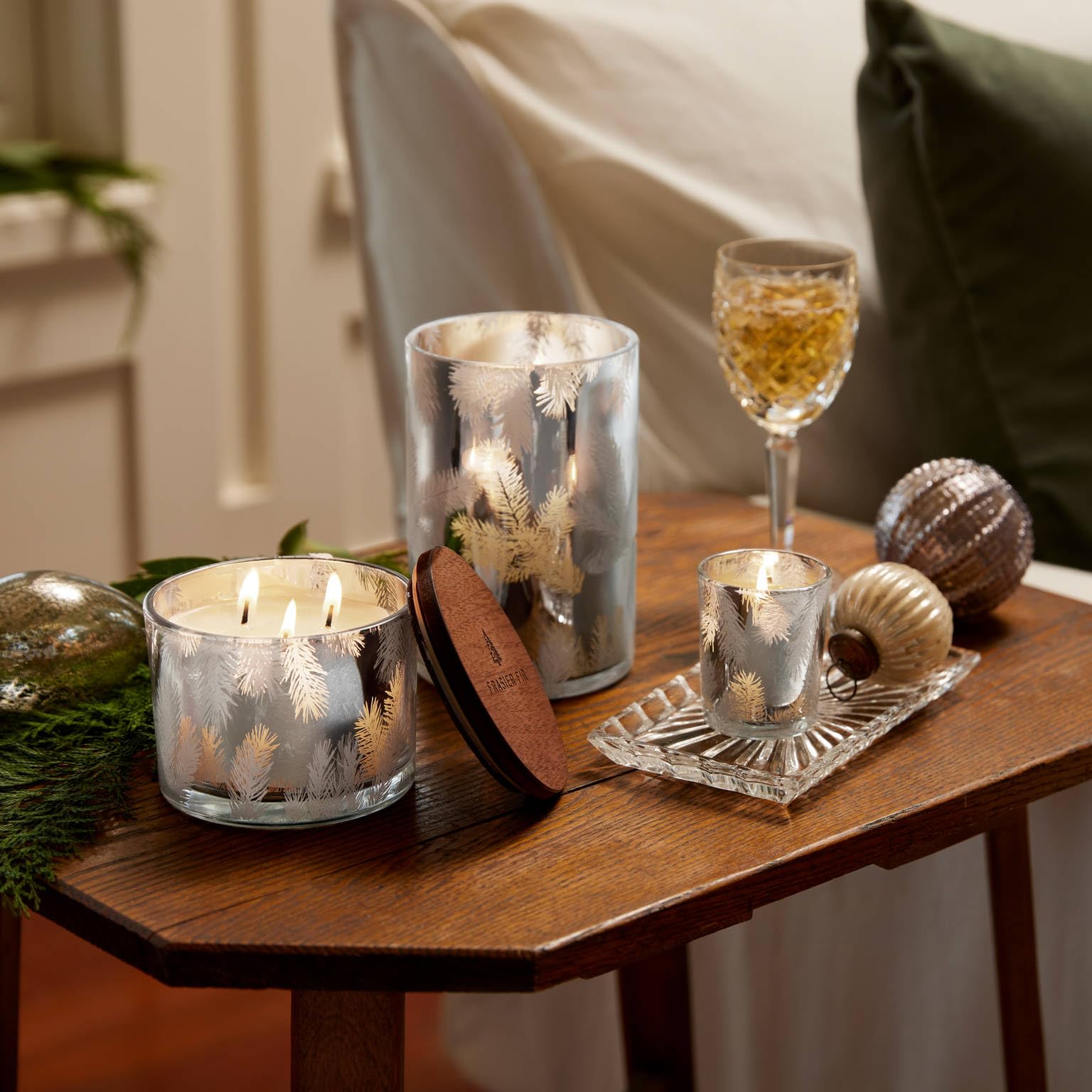 Thymes Frasier Fir candle with silver lid adds holiday ambiance