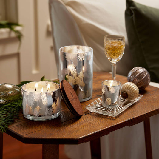 Thymes Frasier Fir candle with silver lid adds holiday ambiance