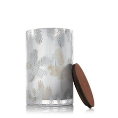 Thymes Frasier Fir candle with silver pine-needle luminary enhances festive decor