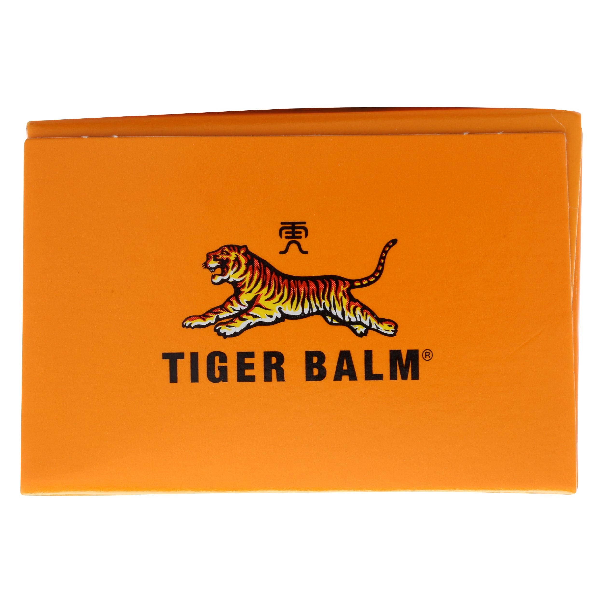 Applying Tiger Balm Arthritis Rub to a joint for temporary relief.