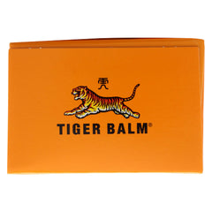 Applying Tiger Balm Arthritis Rub to a joint for temporary relief.