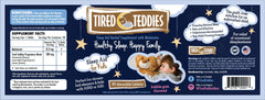 Tired Teddies bedtime routine scene with bottle on nightstand.