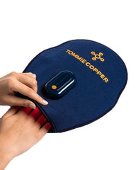 Tommie Copper infrared and red light mitt worn on the hand for soothing warmth.