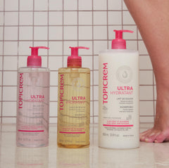 Topicrem Ultra-Hydratant Shower Gel bottle on packaging emphasizes family-friendly design.