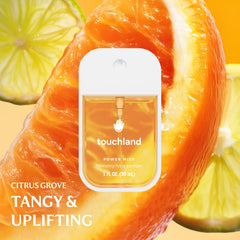Touchland Pure Lavender spray bottle offering calming aroma and skin hydration.