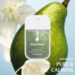 Touchland Travel-size sanitizer spray, 1 oz, ideal for pockets and bags.