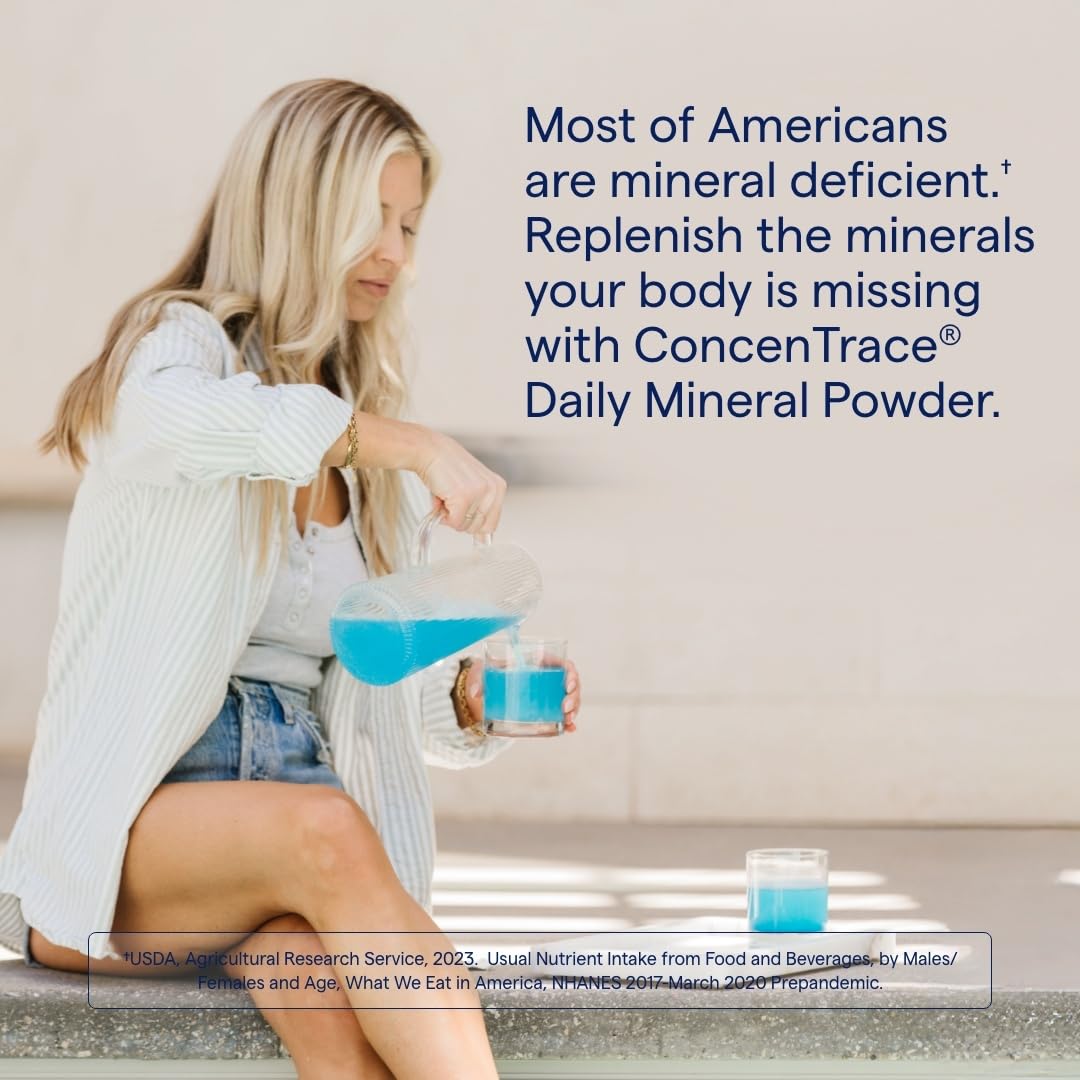 Pouring Trace Minerals ConcenTrace powder into a glass to boost hydration
