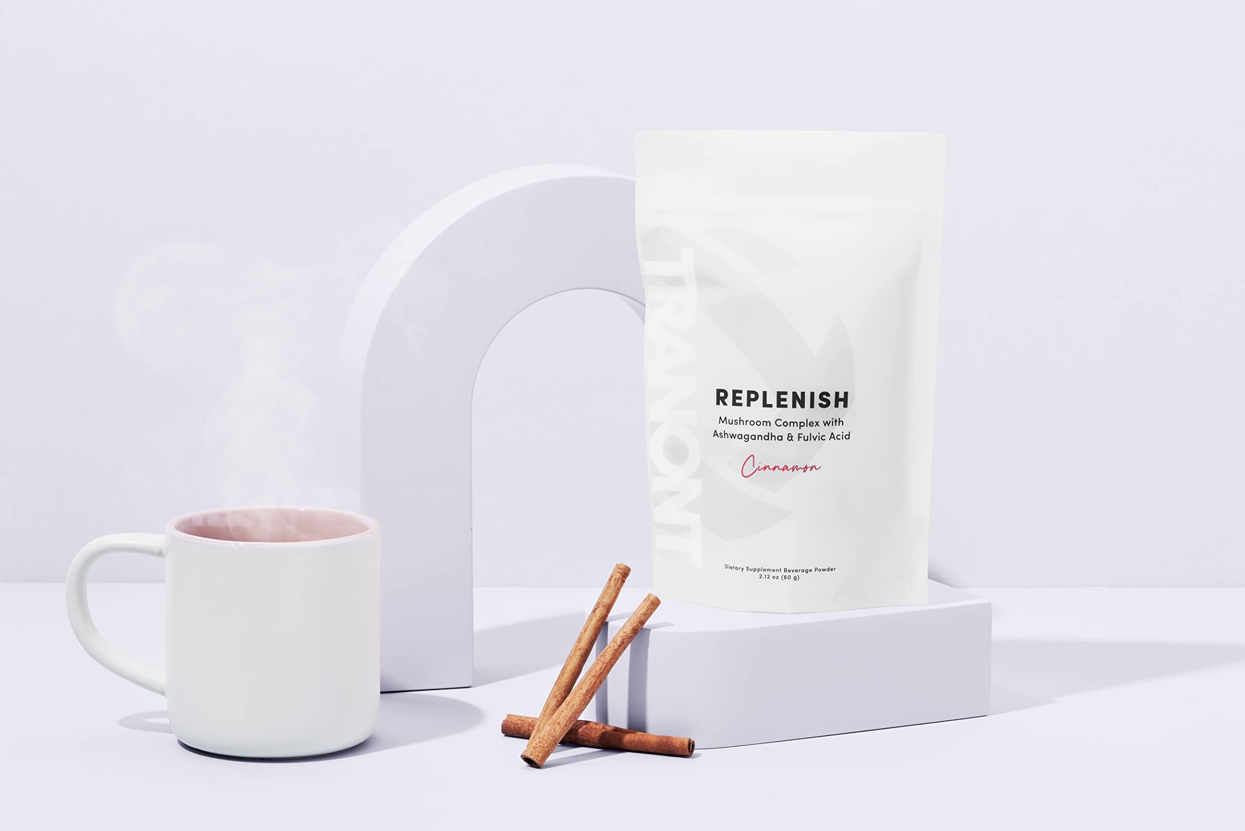 Tranont Replenish cinnamon flavor served in a mug, comforting daily ritual.