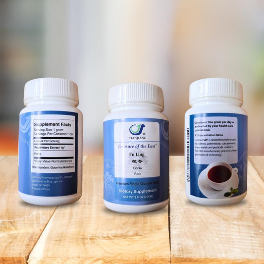 Treasure of the East Poria Fu Ling granules with scoop for easy daily dosing.