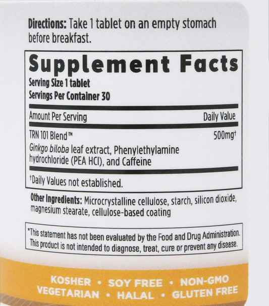 Tri Nutra Cogniben tablet closeup highlights caffeine and PEA for energy.