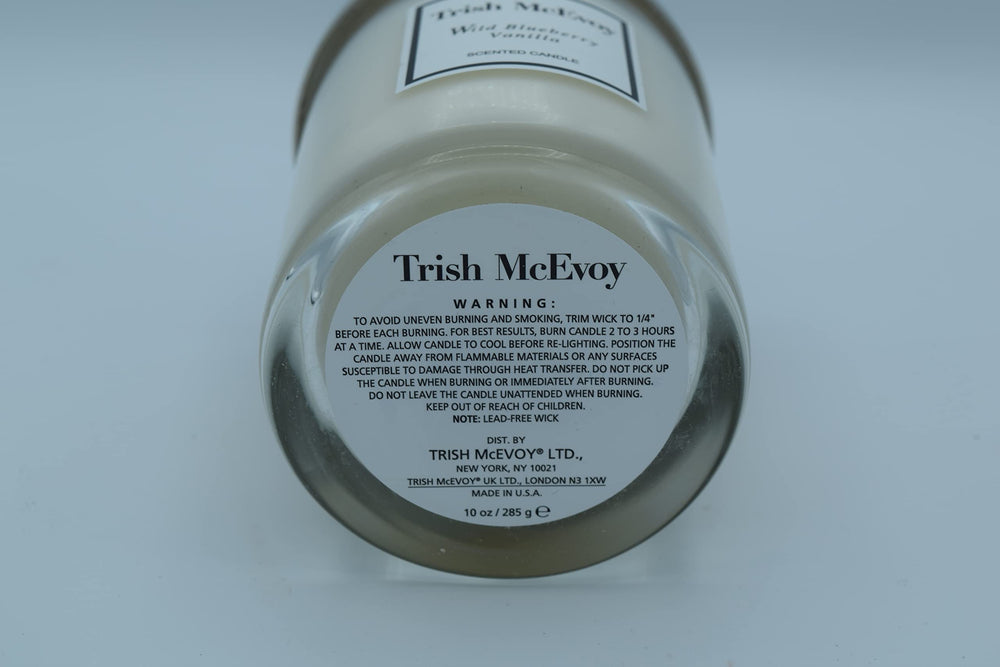 Trish McEvoy Wild Blueberry Vanilla candle offers 40-50 hour burn time for longer ambiance.