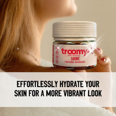 Serving size shown on the Troomy Shine bottle for daily use.